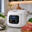 Smart rice cooker atau rice cooker pintar di meja dapur bersama nasi, sayuran, ikan, dan daging